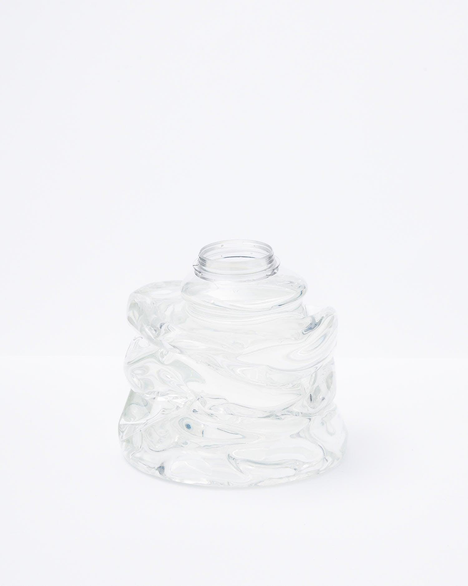 White background, transparent handmade recycled plastic vase small.