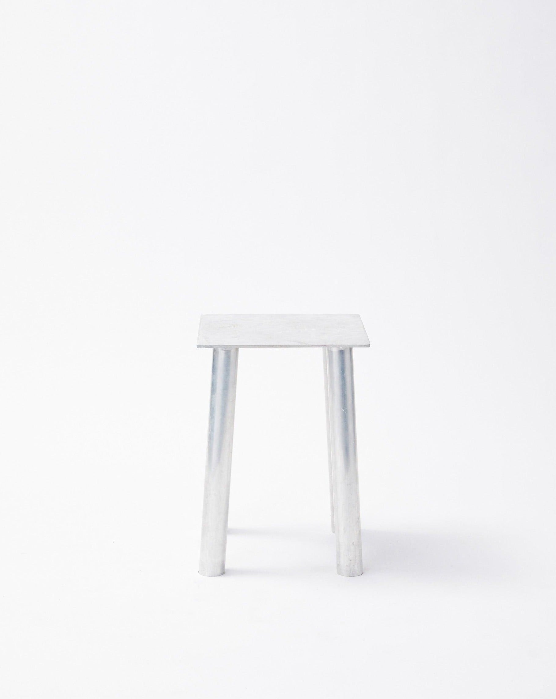 Decorative aluminum stool P-L series in white background