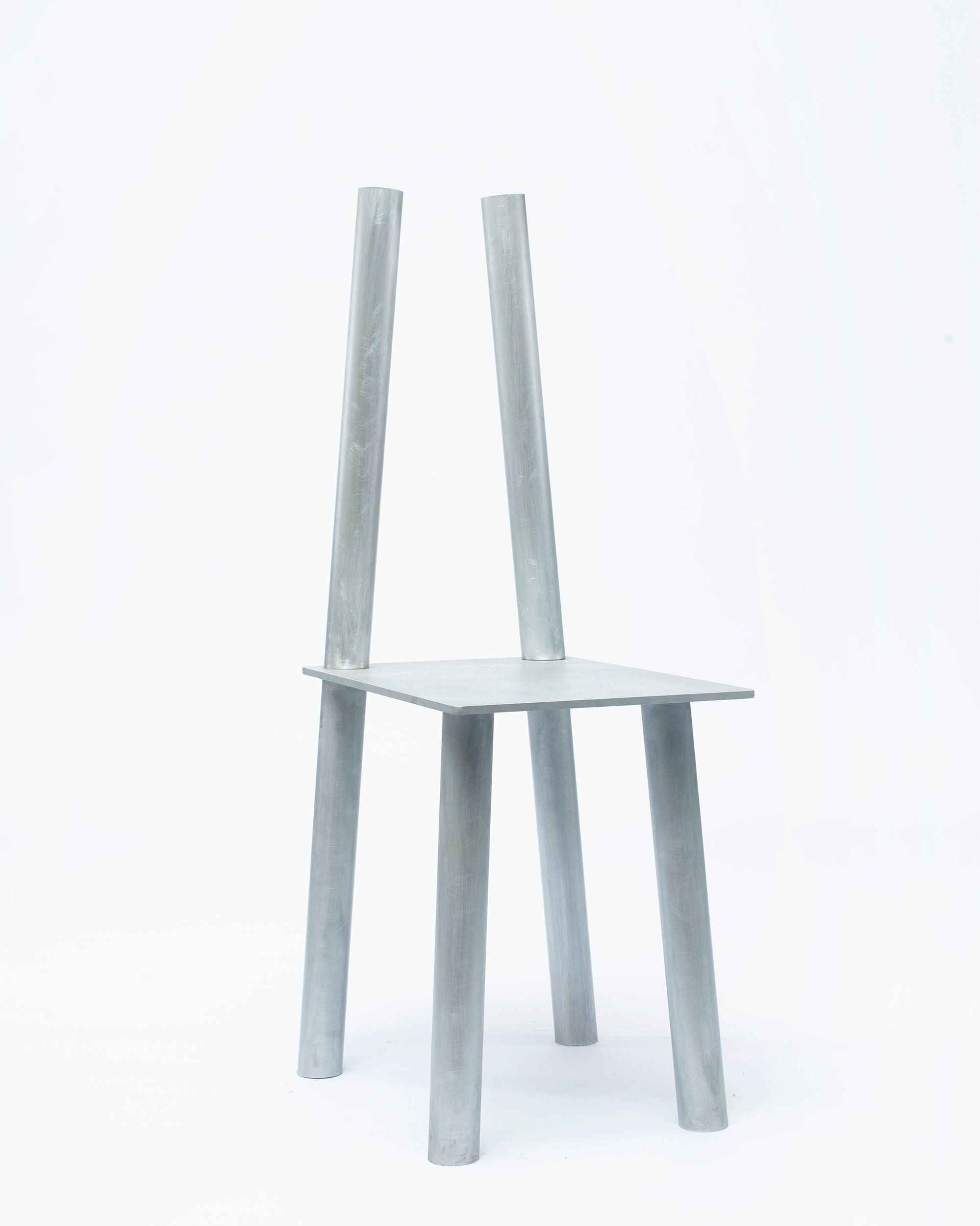 Aluminum decorative chair P-L series with slanted view on white background