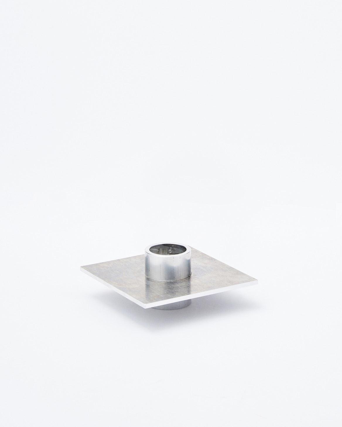 White background, Aluminium Candlestick P-L series in inclined position 