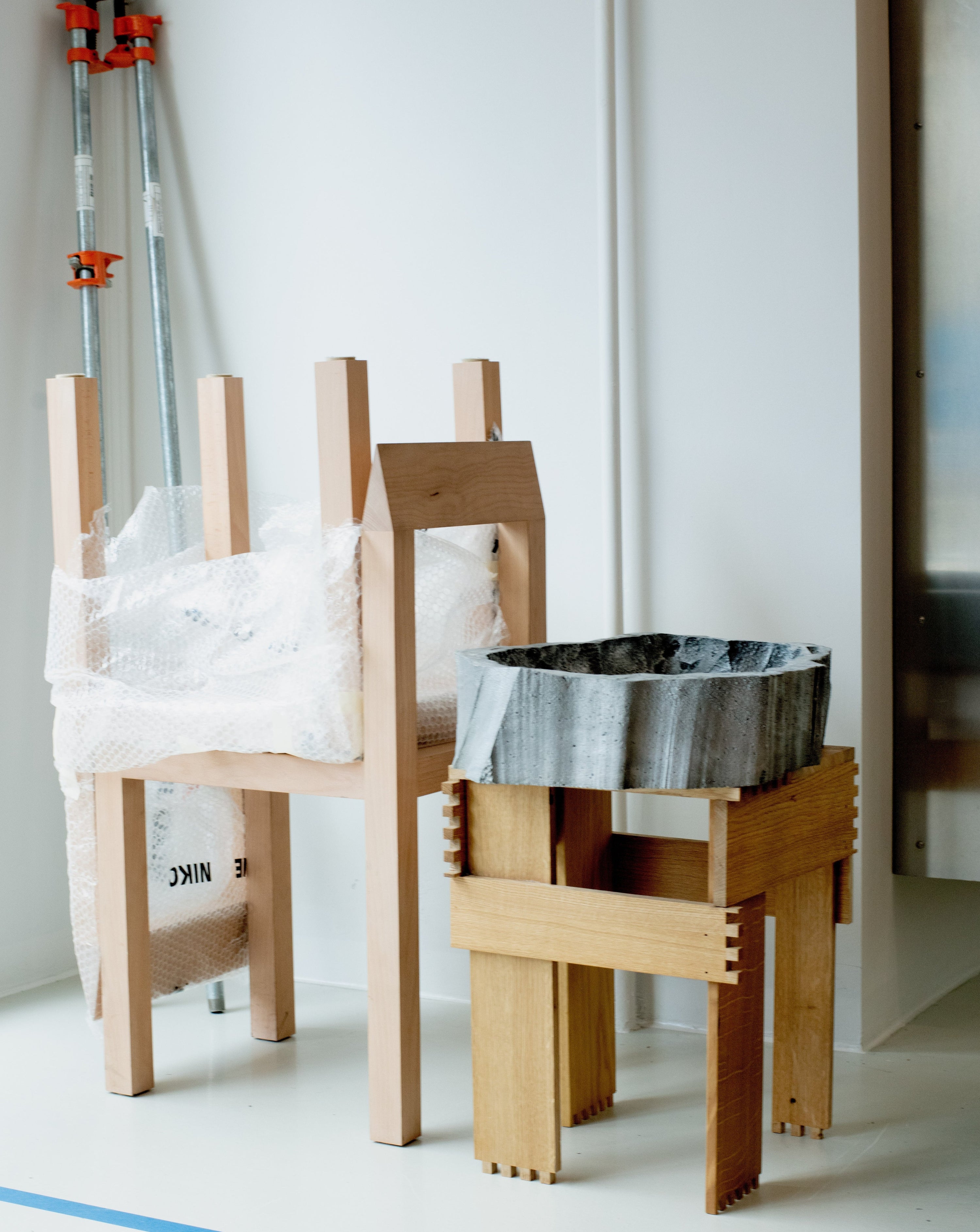 Scooped bucket object handmade by NIKO JUNE on wooden chair