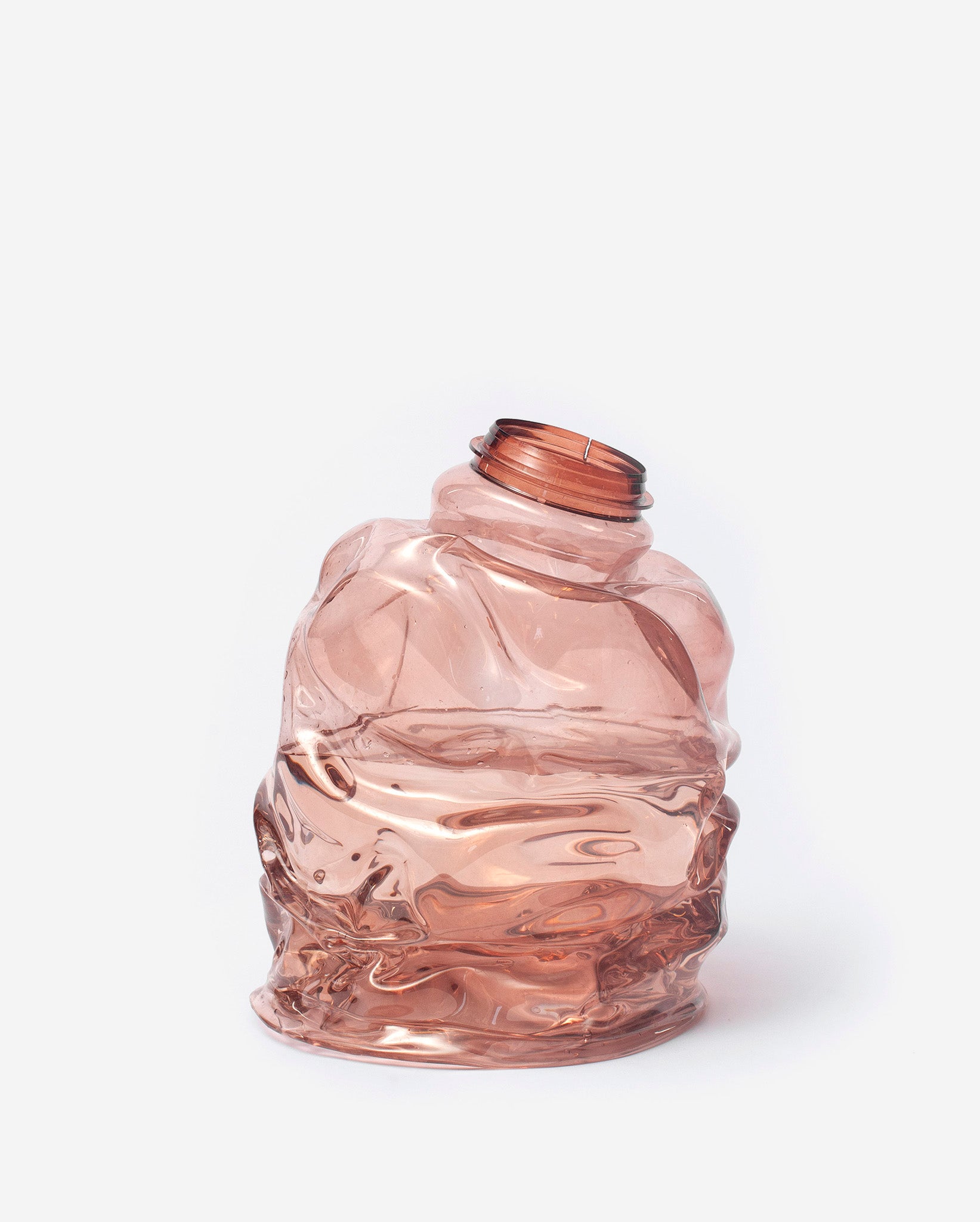 Small brown handmade recycled plastic vase on a white background