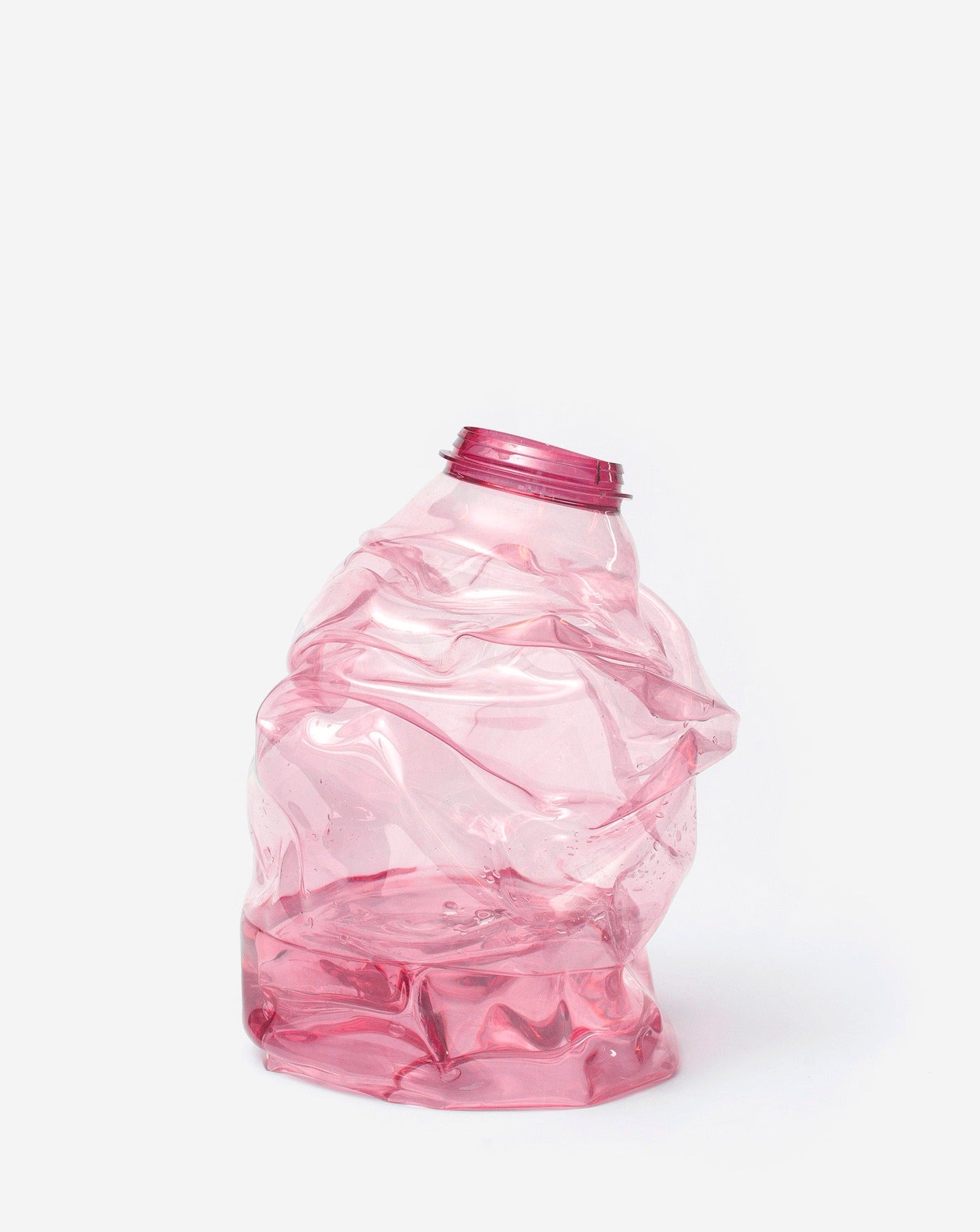 Medium pink handmade recycled plastic vase on white background