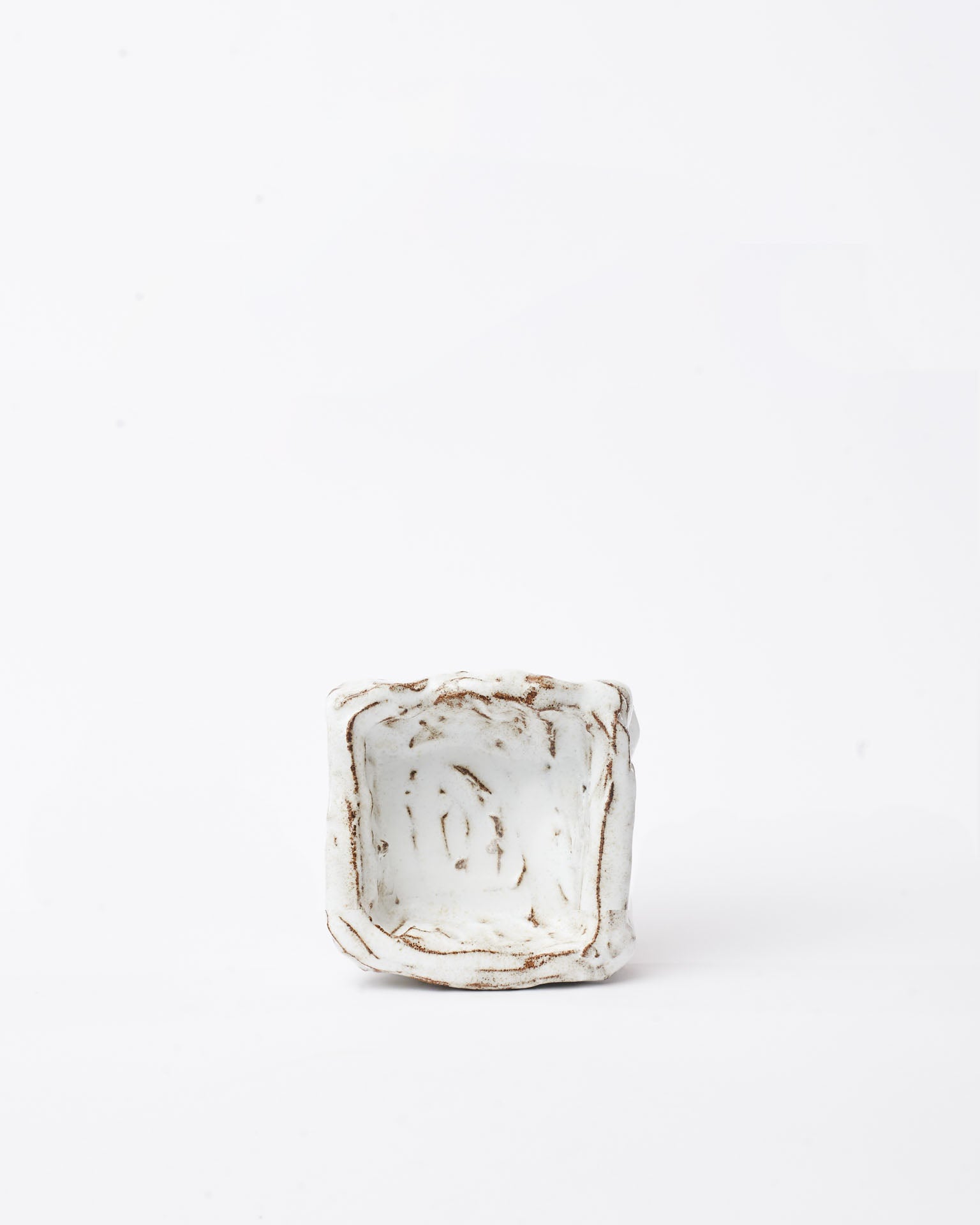 Handmade ceramic organizer object white upright in white background