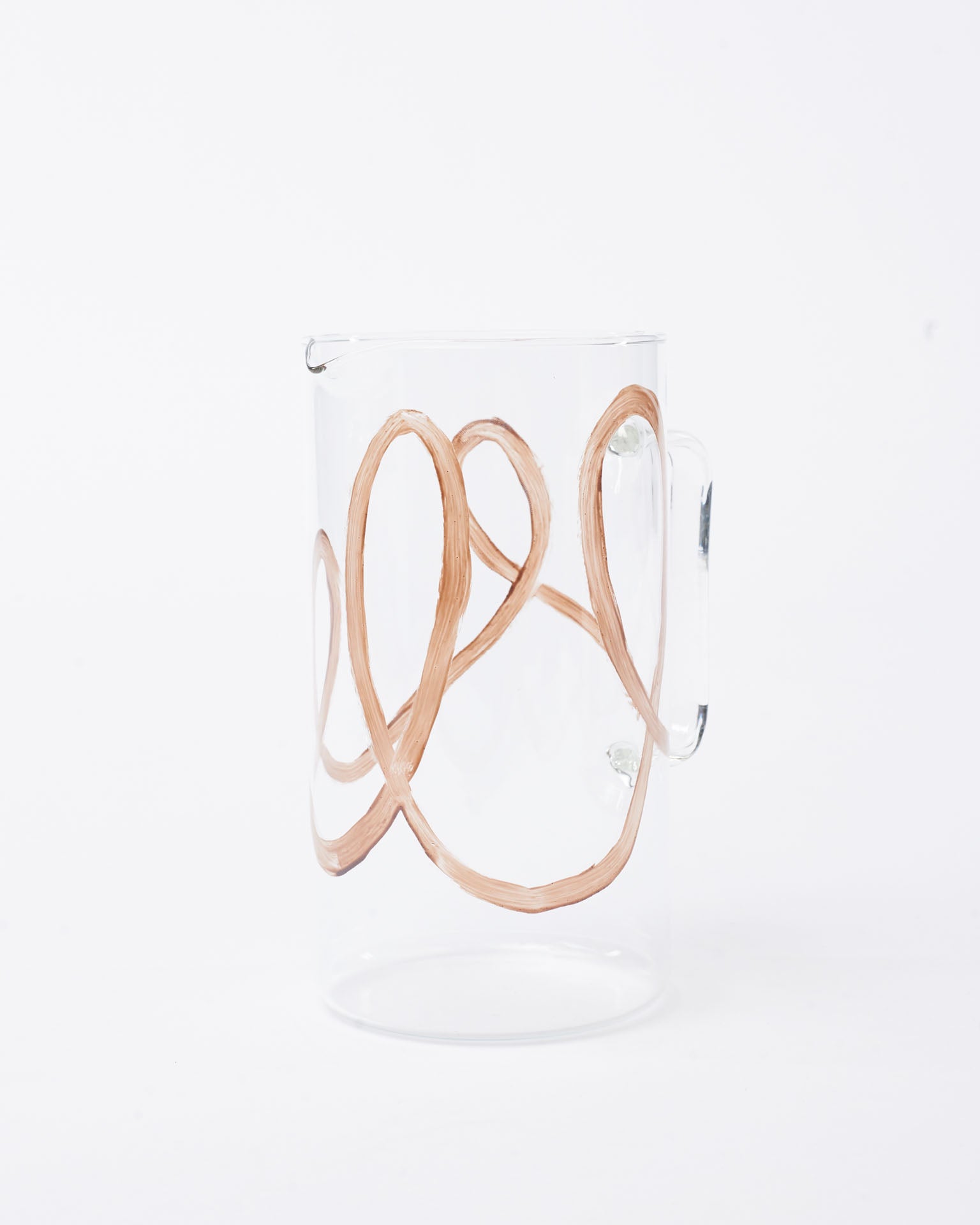 Glass pitcher burgundy swirl design in white background 