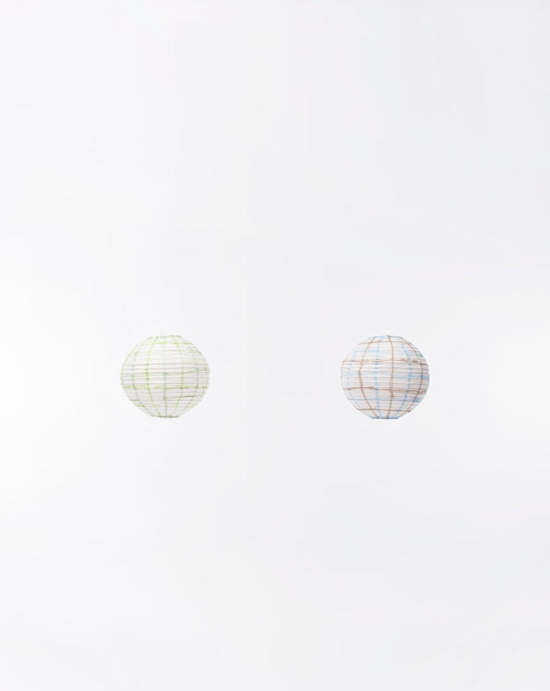 Modern three glitch globes with brown and blue lines in vertical position on white background