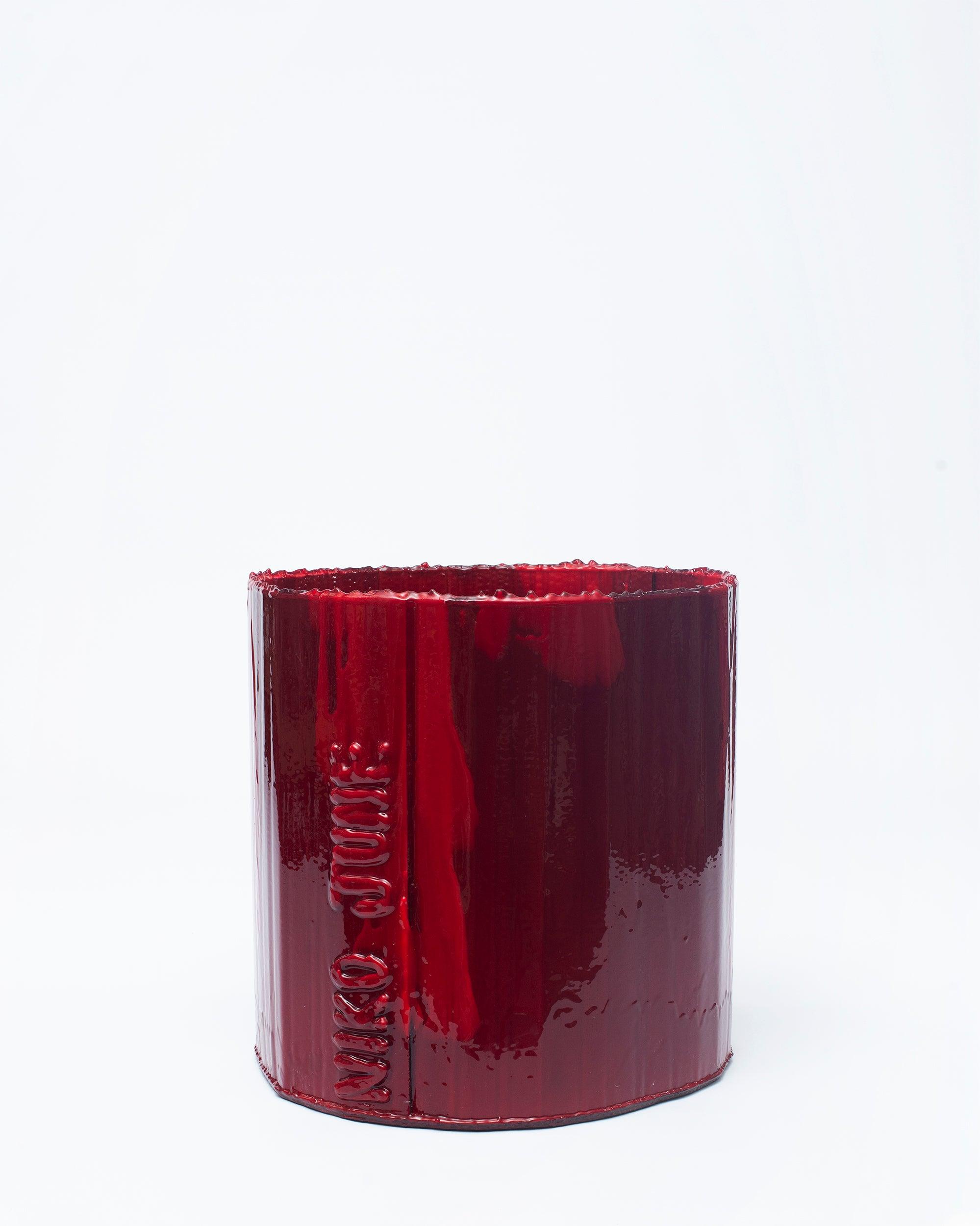 White background, NIKO JUNE logo in handmade organizer object Deep Flex red