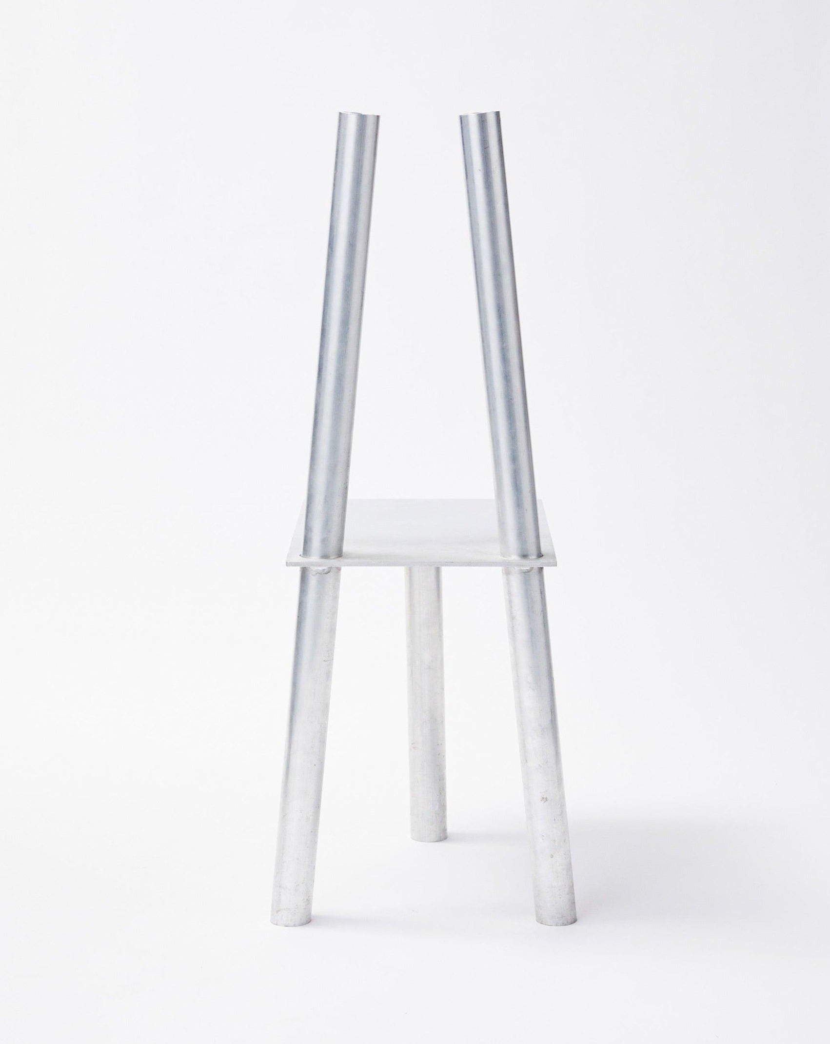 White background, aluminum decorative chair P-L series in rearward facing position