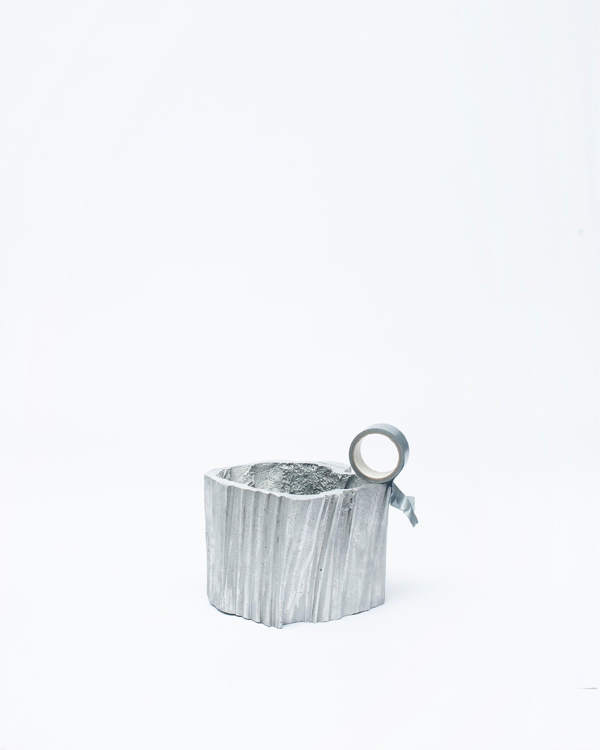 White background, scooped bucket smaller with round handle